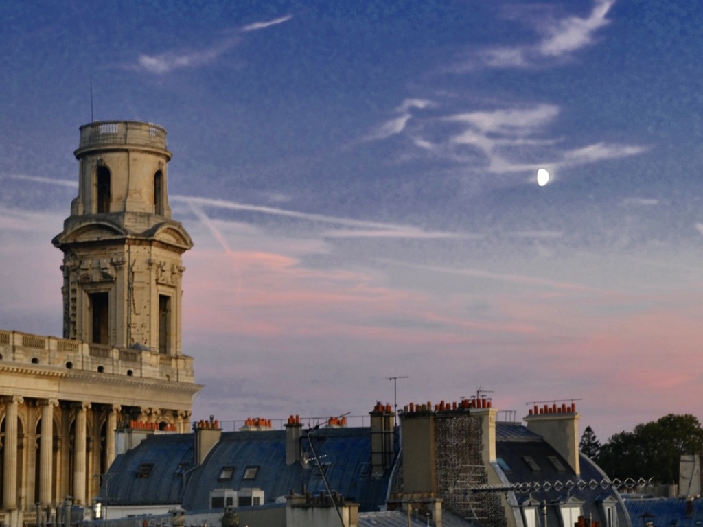 Sunset moon over Saint Sulpice in Paris. Photo: Ron Fox
