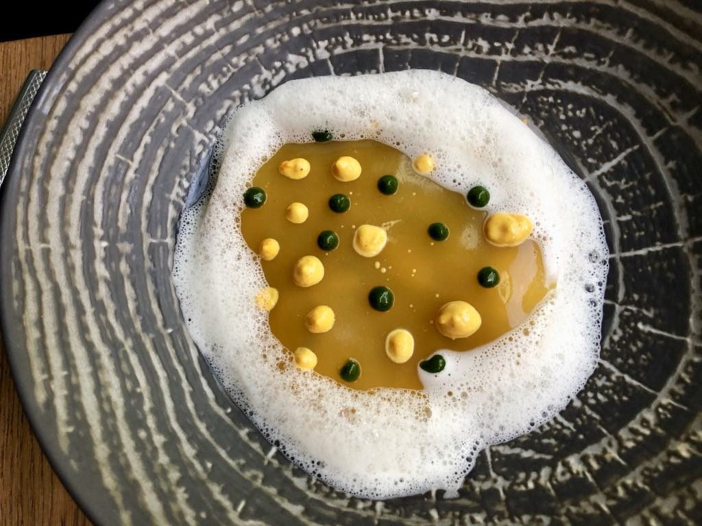 Cockles with saffron-flavored gelée. The restaurant Variations in Paris’s 11th arrondissement.