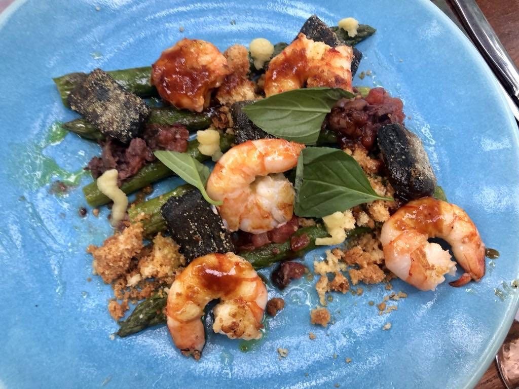 Gambas with asparagus and gnocchi.