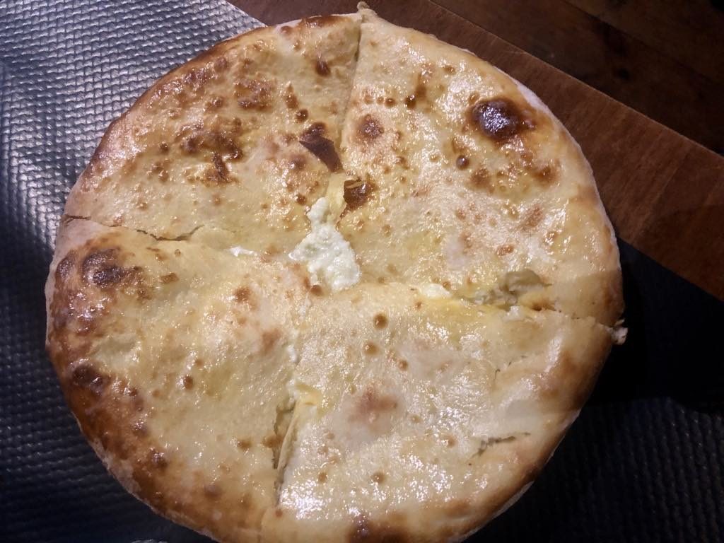 KhachapurI, a cheese-filled flatbread.