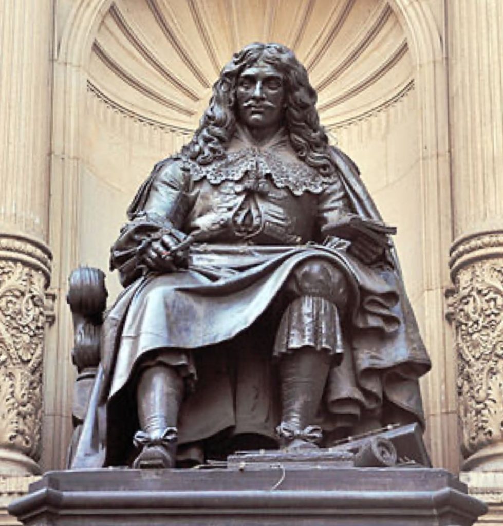 The bronze statue of Molière by Bernard-Gabriel Seurre on the fountain at the corner of Rue Richelieu and Rue Molière in Paris. Wikimedia Commons