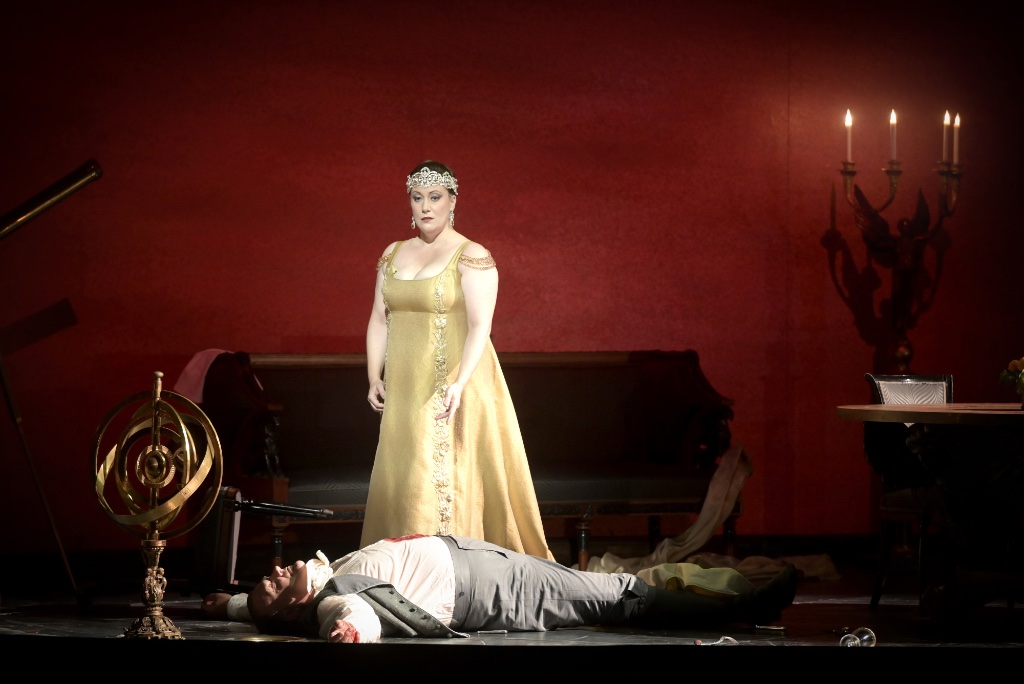 Tosca (Saloa Hernández) stands over the body of the evil Scarpia (Bryn Terfel). Photo: Vincent Pontet