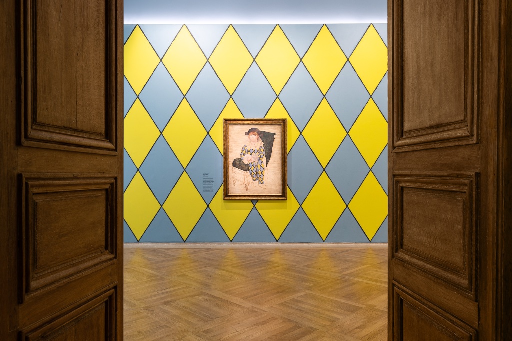 Exhibition view of "Picasso Celebration: The Collection in a New Light,” designed by Paul Smith, at the Musée National Picasso Paris, with "Paul as Harlequin" (1924). © Vinciane Lebrun/Voyez-Vous