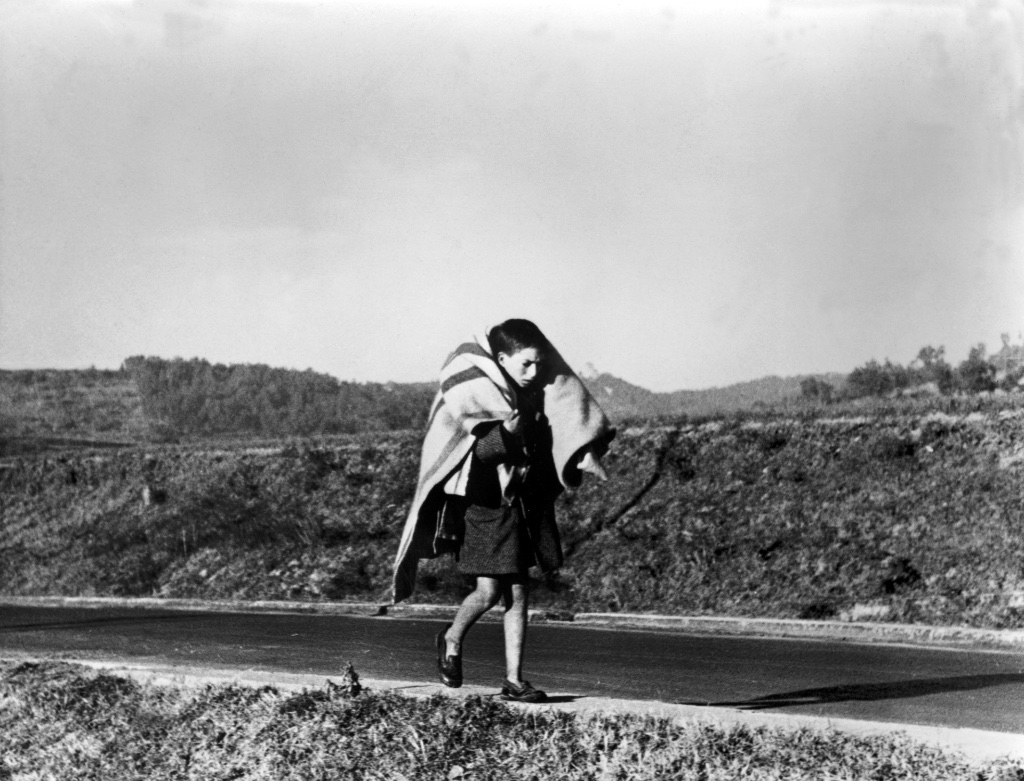 "On the Road from Barcelona to the French border," by Robert Capa © International Center of Photography