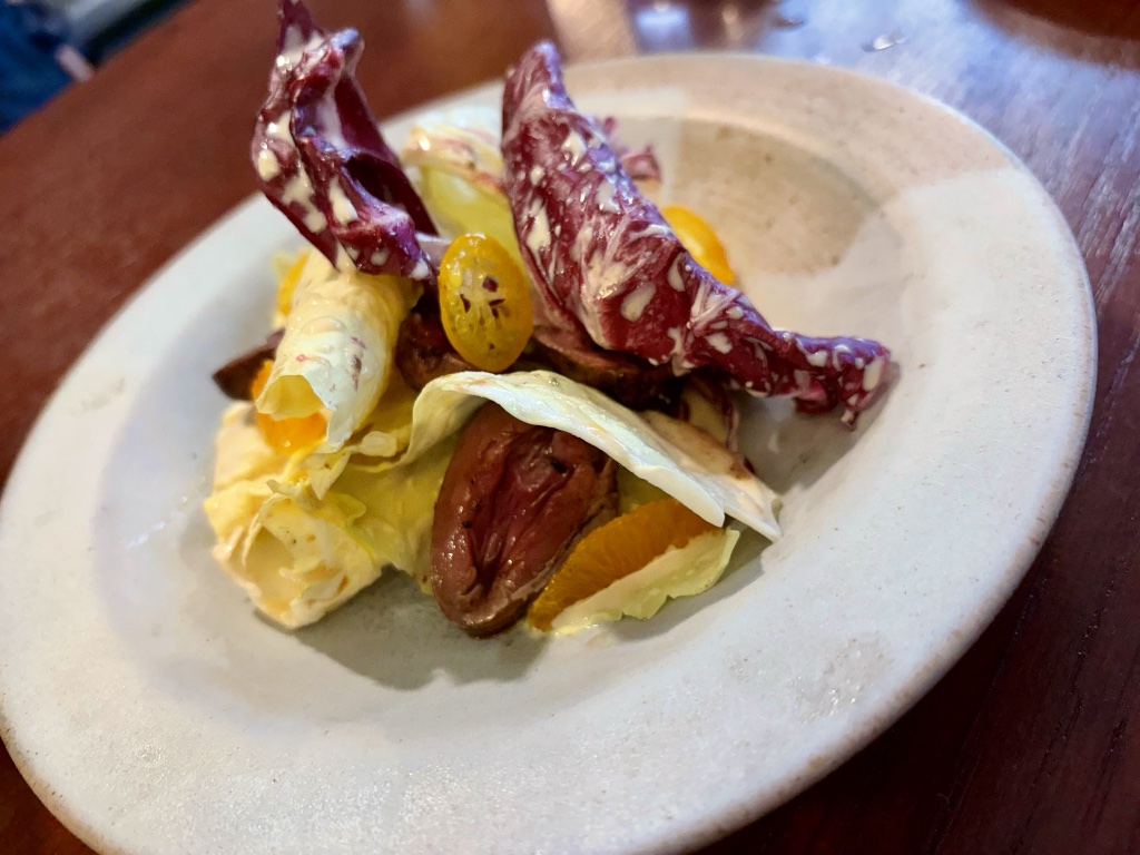 Castelfranco salad with duck hearts.