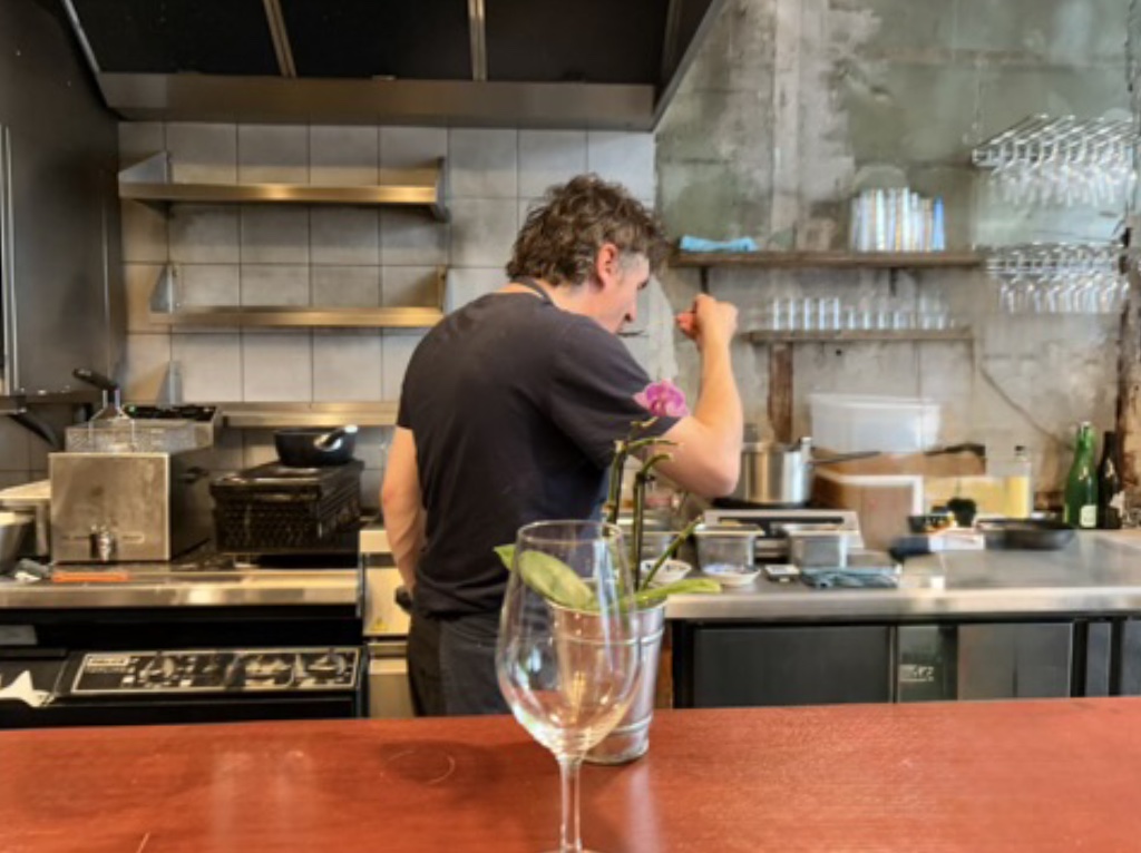 Toy’s chef/owner George Black testing the broth.